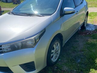 2014 Toyota Corolla XI (E160, E170, E180), серебристый, 930000 рублей, вид 4