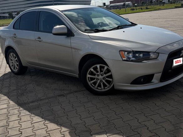 2012 Mitsubishi Lancer X Рестайлинг, серебристый, 850000 рублей - вид 6