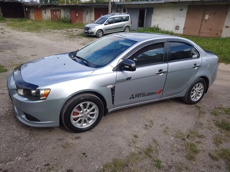 2012 Mitsubishi Lancer X Рестайлинг, серебристый, 680000 рублей, вид 2