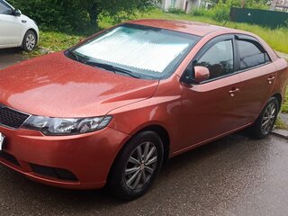 2011 Kia Cerato 6-speed II, оранжевый, 650000 рублей, вид 1