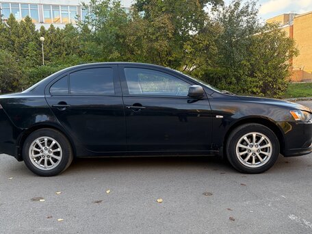 2013 Mitsubishi Lancer X Рестайлинг, чёрный, 820000 рублей, вид 4