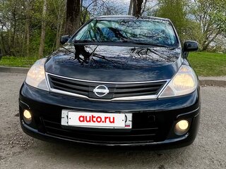 2012 Nissan Tiida I Рестайлинг, чёрный, 750000 рублей, вид 1