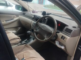 2004 Toyota Corolla Fielder IX (E120, E130) Рестайлинг, чёрный, 750000 рублей, вид 5