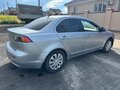2011 Mitsubishi Lancer X Рестайлинг, серебристый, 640000 рублей - вид 1