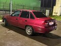 2012 Daewoo Nexia I Рестайлинг, пурпурный, 260000 рублей - вид 5