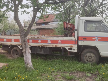 1990 Isuzu Elf (N-series), белый, 1450000 рублей, вид 4