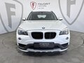 2014 BMW X1 20i I (E84) Рестайлинг, белый - вид 1