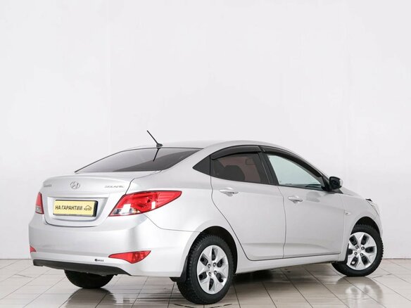 2014 Hyundai Solaris I Рестайлинг, серебристый, 1049000 рублей - вид 5