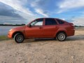 2014 Lada (ВАЗ) Granta I, оранжевый, 280000 рублей - вид 6