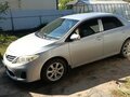 2012 Toyota Corolla X (E140, E150) Рестайлинг, серебристый, 1250000 рублей - вид 2