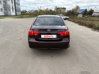 2009 Hyundai Elantra IV (HD), пурпурный, 495000 рублей, вид 2
