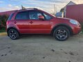 2010 Suzuki SX4 I (Classic) Рестайлинг, оранжевый, 645000 рублей - вид 5