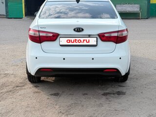 2012 Kia Rio 5-speed III, белый, 550000 рублей, вид 5