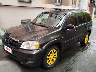 2005 Mazda Tribute I Рестайлинг, коричневый, 390000 рублей, вид 1