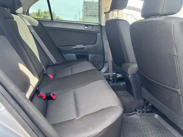 2011 Mitsubishi Lancer X Рестайлинг, серебристый, 640000 рублей - вид 7