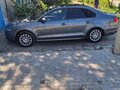 2014 Volkswagen Jetta VI, серый, 1010000 рублей - вид 2