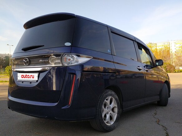 2009 Mazda Biante, синий, 1100000 рублей - вид 3