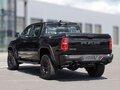 2026 Ram 1500 RHO V Рестайлинг, чёрный - вид 4