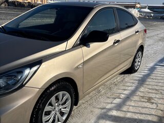 2011 Hyundai Solaris I, золотистый, 630000 рублей, вид 3
