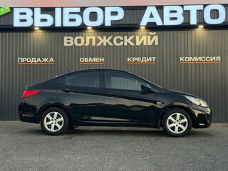 2012 Hyundai Solaris I, чёрный, 710000 рублей, вид 3