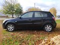 2010 Kia Rio II Рестайлинг, чёрный, 549000 рублей - вид 2