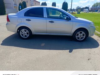 2011 Chevrolet Aveo I Рестайлинг, серебристый, 340000 рублей, вид 2