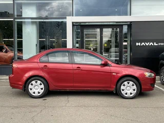 2008 Mitsubishi Lancer X, красный, 369000 рублей, вид 4