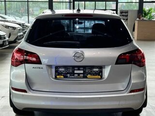 2012 Opel Astra J Рестайлинг, серебристый, 850000 рублей, вид 4