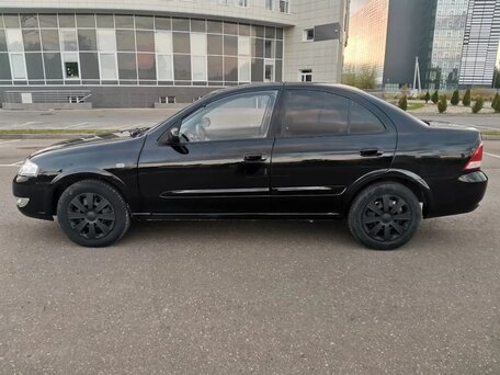 2010 Nissan Almera Classic I, чёрный, вид 3