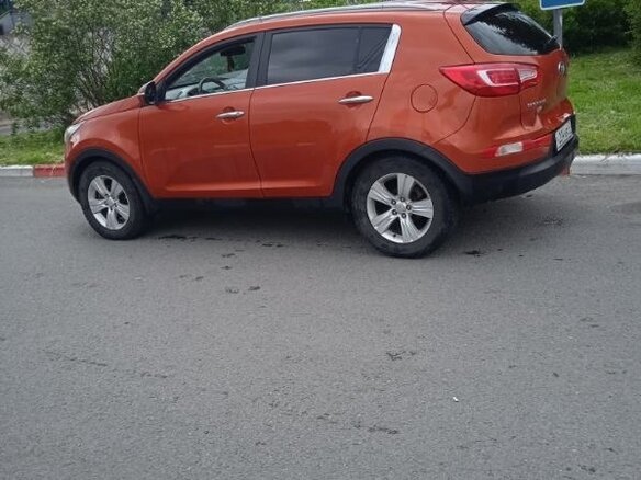 2011 Kia Sportage III, оранжевый, 950000 рублей - вид 4