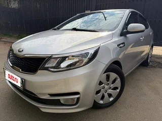 2015 Kia Rio 6-speed III, серый, 955000 рублей, вид 4