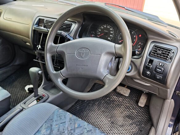 1999 Toyota Corolla VII (E100), синий - вид 10