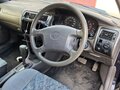 1999 Toyota Corolla VII (E100), синий - вид 10