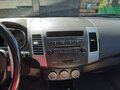 2008 Mitsubishi Outlander II, серый, 950000 рублей - вид 6