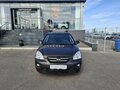 2010 Kia Carens II (UN), коричневый, 740000 рублей - вид 1