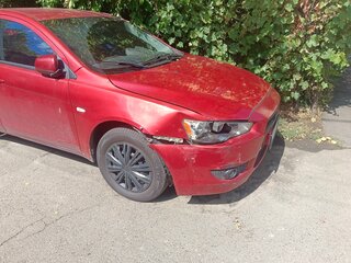 2007 Mitsubishi Lancer X, красный, 450000 рублей, вид 1