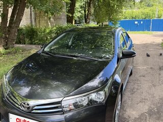 2013 Toyota Corolla XI (E160, E170, E180), чёрный, 1450000 рублей, вид 2