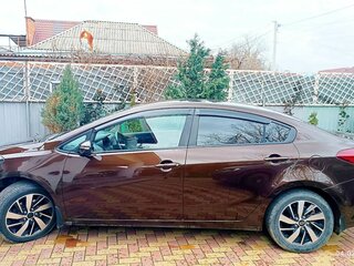 2016 Kia Cerato III Рестайлинг (Classic), коричневый, 1130000 рублей, вид 3