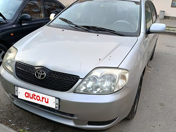 2003 Toyota Corolla IX (E120, E130), серебристый