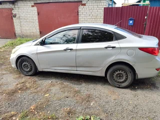 2011 Hyundai Solaris I, серебристый, 475000 рублей, вид 2