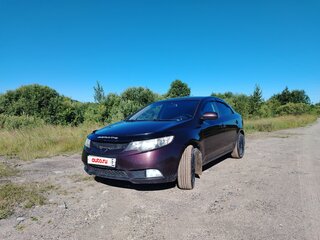 2011 Kia Cerato 6-speed II, пурпурный, 750000 рублей, вид 1