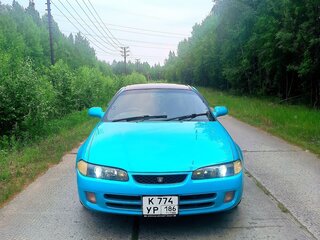 1996 Toyota Sprinter Marino, зелёный, 600000 рублей, вид 2