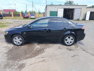 2013 Mitsubishi Lancer X Рестайлинг, чёрный, 700000 рублей, вид 3
