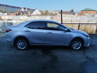 2014 Toyota Corolla XI (E160, E170, E180), серебристый, 1265000 рублей, вид 2
