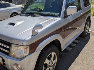 2009 Mitsubishi Pajero Mini II, серебристый, 895000 рублей, вид 2