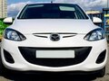 2012 Mazda 2 II Рестайлинг (DE2), белый, 920000 рублей