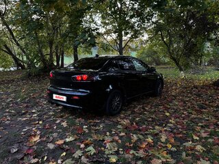 2011 Mitsubishi Lancer X Рестайлинг, чёрный, 730000 рублей, вид 4