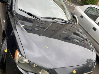 2012 Mitsubishi Lancer X Рестайлинг, чёрный, 590000 рублей, вид 3