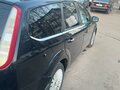2010 Ford Focus II Рестайлинг, чёрный, 580000 рублей - вид 2