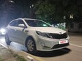 2014 Kia Rio 4-speed III, белый, 910000 рублей - вид 1